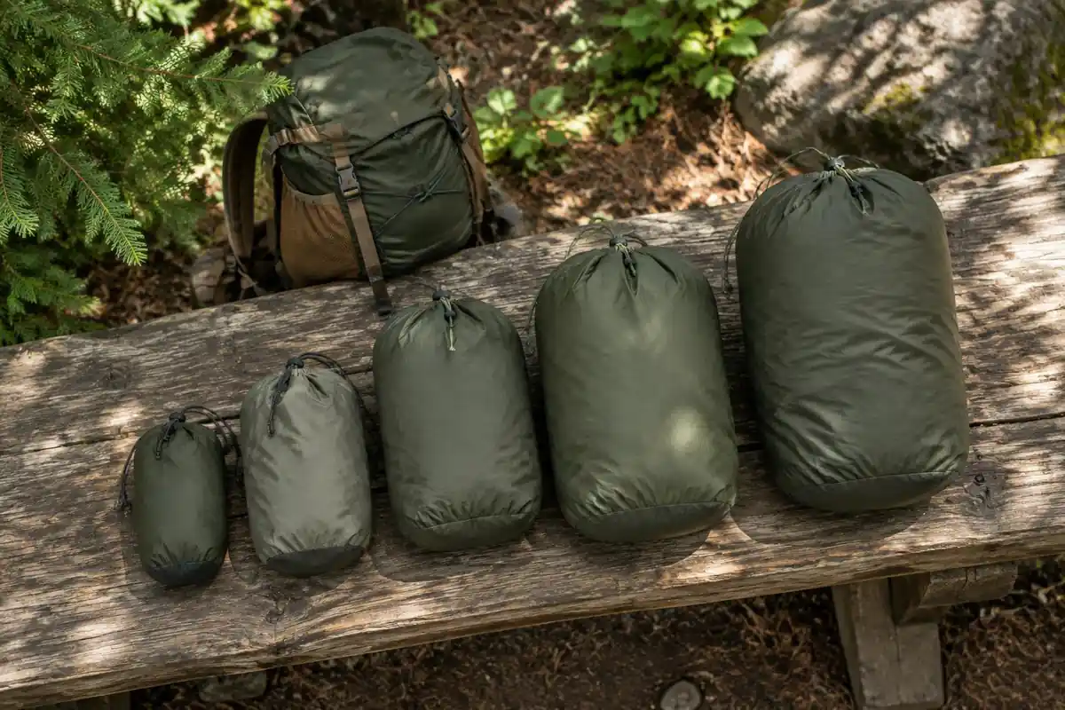 Different sized stuff sacks stacked in ascending size
