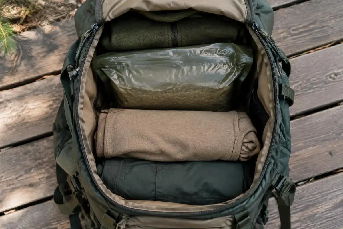 Pack loaded with heavy items close to the back, seen open from above