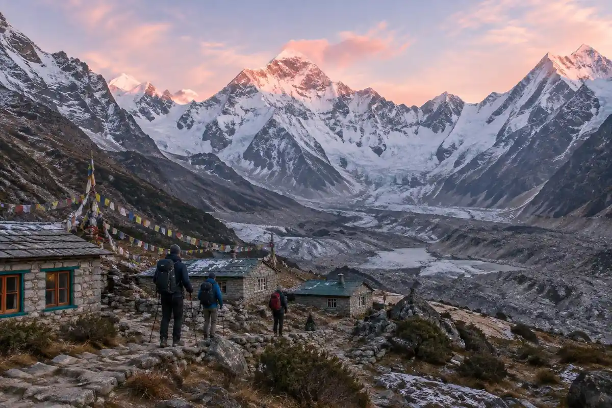 Ring of snowy Himalayan peaks over a glacial basin with tea-house roofs and prayer flags